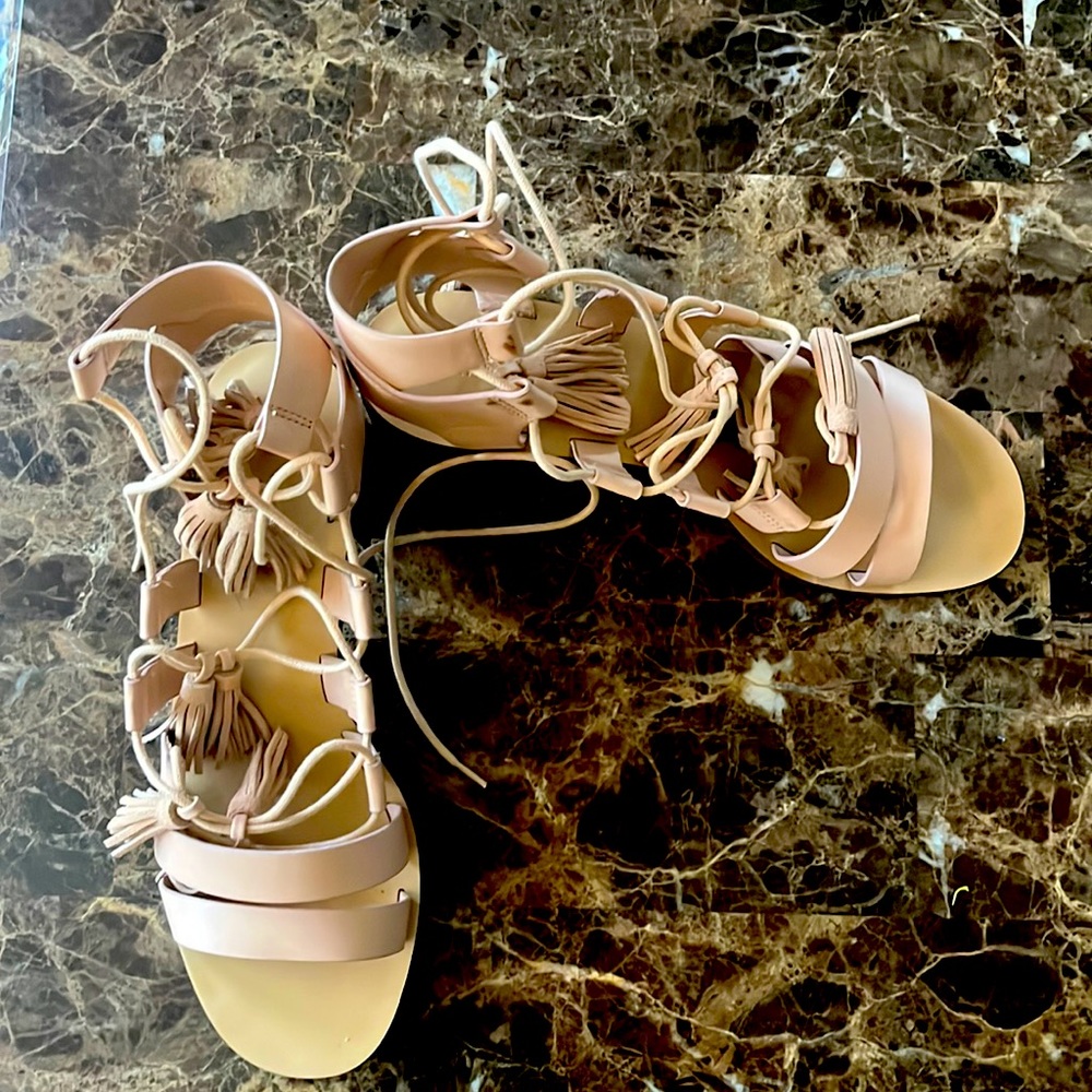 Size 10 , leather tassels